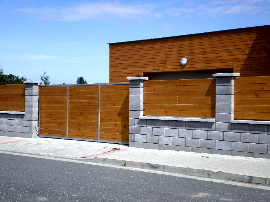 Prefabricated fence elements with wooden infill