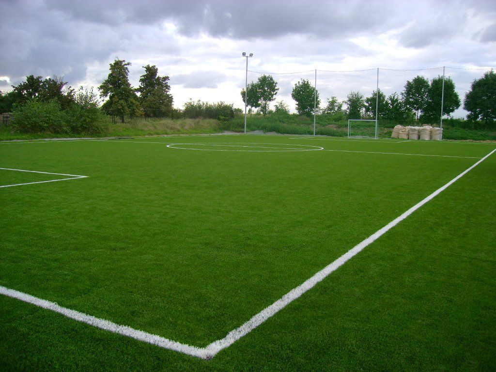 Artificial turf on a football field with permanent lines