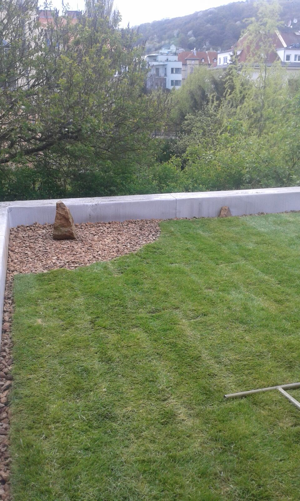 Roof garden with carpeted lawn