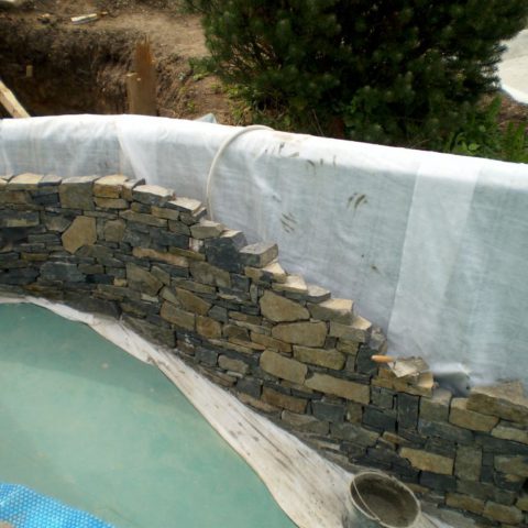 Working with stone inside the bathing area of the Biotope